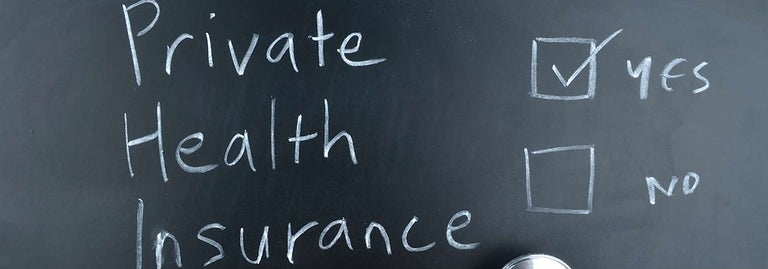 Private Health Insurance on Blackboard in form of checklist