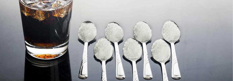 Seven spoons of sugar with soft drink